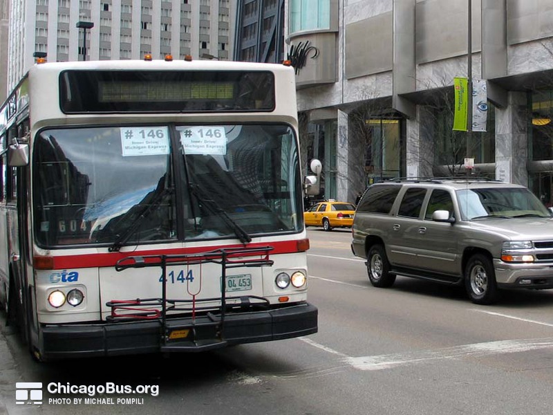 Bus #4144 at Michigan and Pearson, working route #146 Inner Drive/Michigan Express, on March 11, 2004.