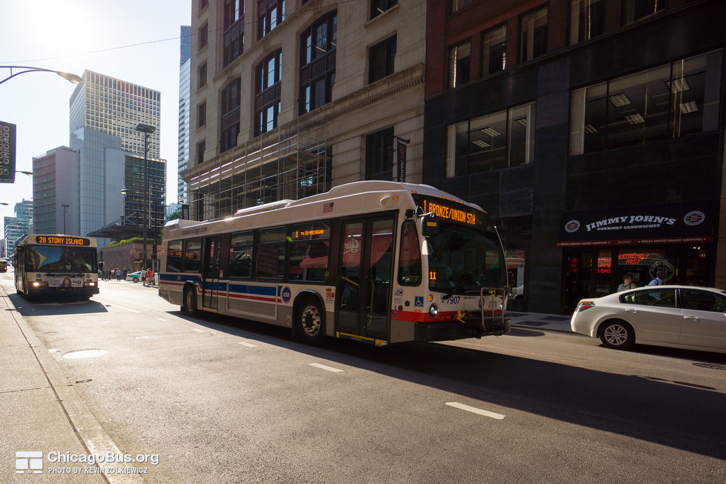 Bus #7907 at Jackson and Franklin, working route #1 Bronzeville/Union Station, on July 18, 2014.