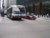 Bus #6441 at Jackson and Dearborn, working route #1 Indiana/Hyde Park, on August  4, 2005. This bus uses a high-resolution Aesys destination sign.