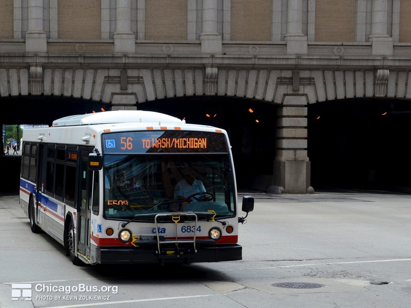 Bus #6834 at Washington and Clinton, working route #56 Milwaukee, on August  6, 2011.