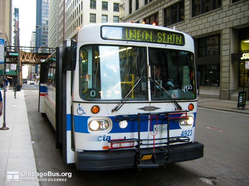 Bus #4923 (ex-Pace 2119) at Jackson and Michigan working route #X28 Stony Island Express on June 10, 2005.