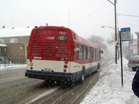 Prototype bus #7800 at California and Archer, on its way to Archer Garage, on January 22, 2005.