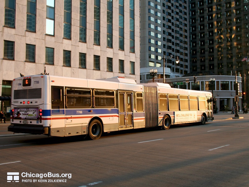 Bus #7706 at Wacker and State, working route #6 Jackson Park Express, on April 13, 2006.