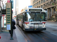 Bus #7405 at State and Washington, working route #146 Inner Drive/Michigan Express, on November 26, 2003.