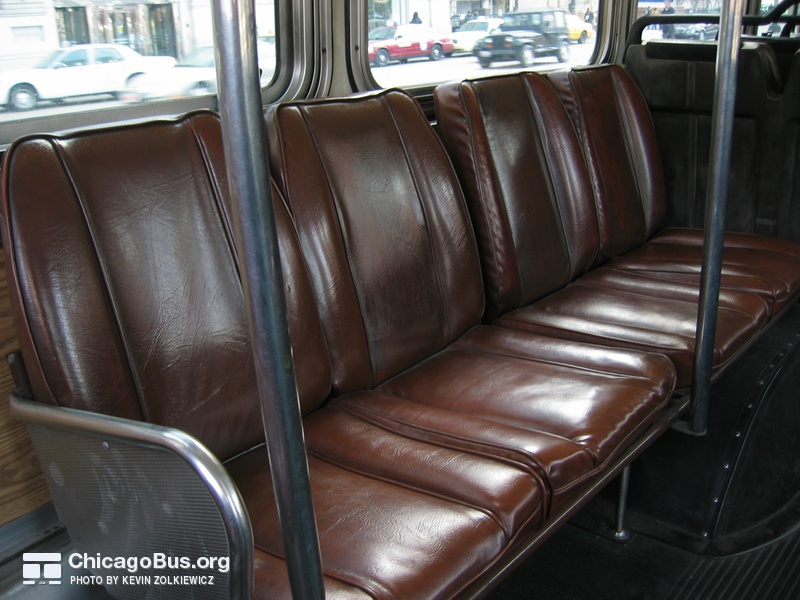 The 7300-series featured brown leather seats, uncommon for CTA buses, as seen in this April 13, 2004 photograph.