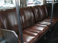 The 7300-series featured brown leather seats, uncommon for CTA buses, as seen in this April 13, 2004 photograph.