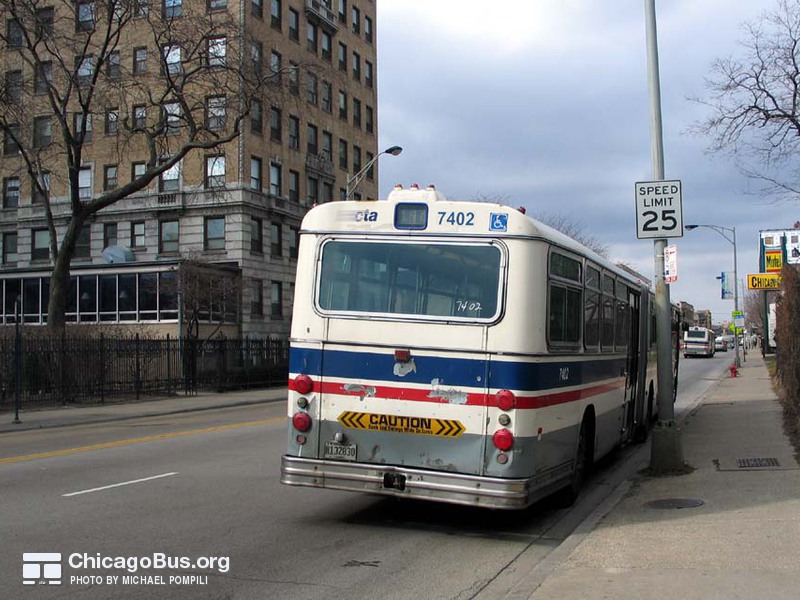 Bus #7402 at Foster and Marine, working route #147 Outer Drive Express, on March 11, 2004.