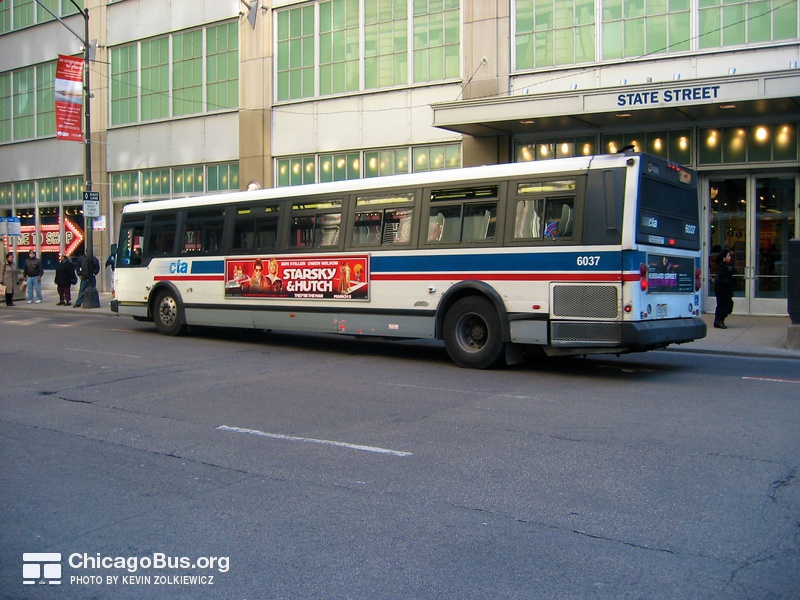 Bus #6037 at Washington and State on February 26, 2004.