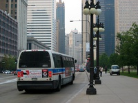 Bus #4555 at Michigan and Monroe, working route #143 Stockton/Michigan Express, on September 11, 2003.