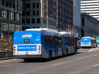 Bus #4097 at Michigan and Madison, working route #J14 Jeffery Jump, on January 16, 2013. In the distance is bus #4085.