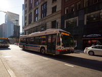 Bus #7907 at Jackson and Franklin, working route #1 Bronzeville/Union Station, on July 18, 2014.