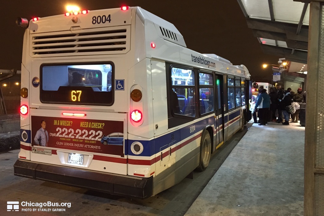Bus #8004 at 69th Red Line Station, working route #67 67th/69th/71st, on February 20, 2015.