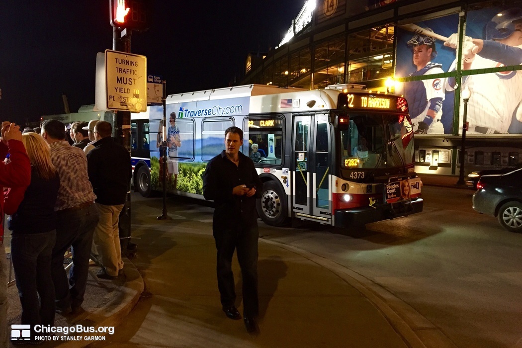 Bus #4373 at Clark and Addison (Wrigley Field), working route #22 Clark, on April  4, 2015.
