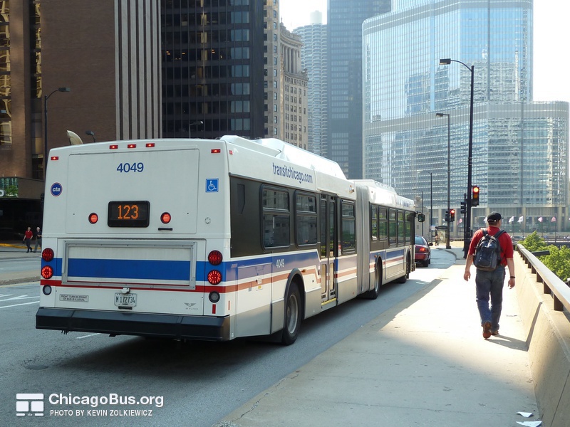 Bus #4049 at Wacker and Stetson, working route #123 Illinois Center/Union Express, on May 25, 2010.