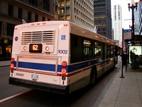 Bus #1002 at Dearborn and Madison, working route #62 Archer, on March 12, 2006.