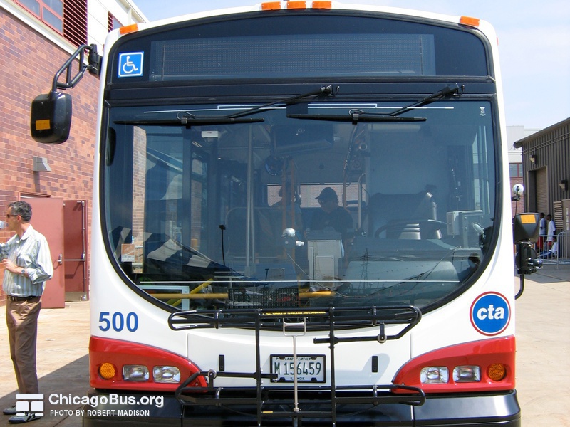 Prototype bus #500 at Skokie Shops on June 17, 2006. Unlike most buses, the windshield wipers on the Optima Opus are mounted at the top of the windshield instead of bottom.