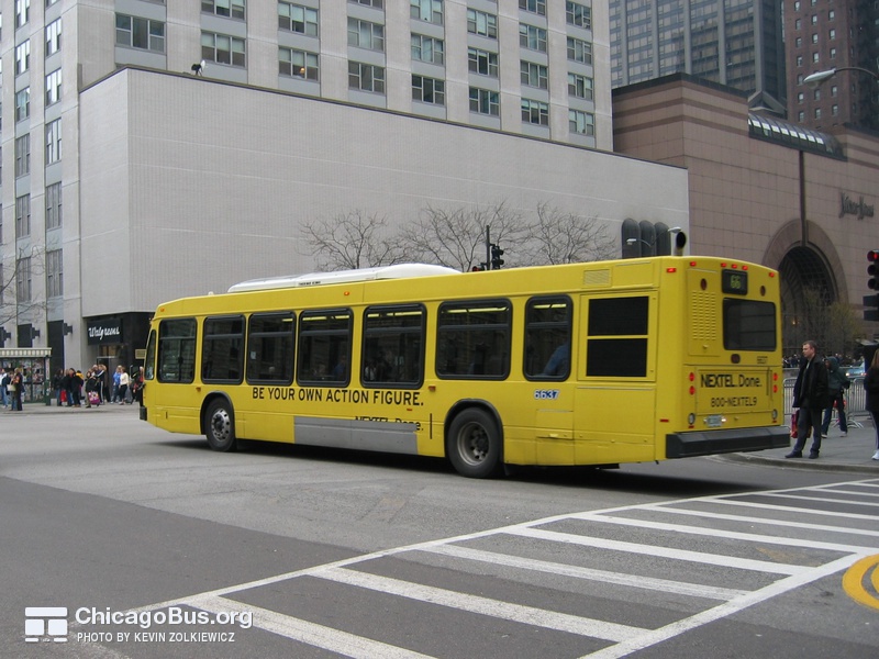 Bus #6637 at Chicago and Michigan, working route #66 Chicago, on November 22, 2003.